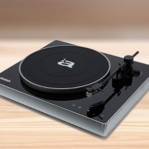Tocadiscos Aiwa con Bluetooth Este tocadiscos incorpora un brazo ajustable con contrapeso metálico y elevación amortiguada